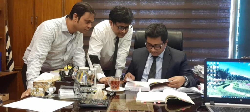 EasyTax Associates reviewing tax and compliance documents